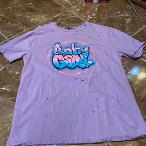 A purple babygirl Fashion Nova shirt in XL.